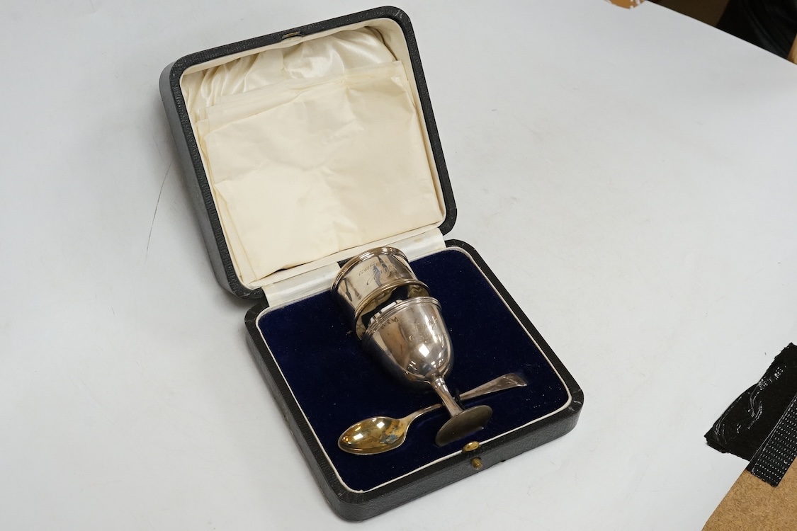 Three assorted silver christening sets including spoon, fork and napkin ring by William Hutton & Sons, London, 1896, one other set with steel knife, two cased sets of silver coffee spoons and a cased set of six Japanese